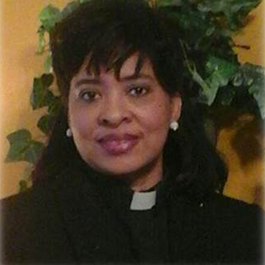 Minister Iris Lucas